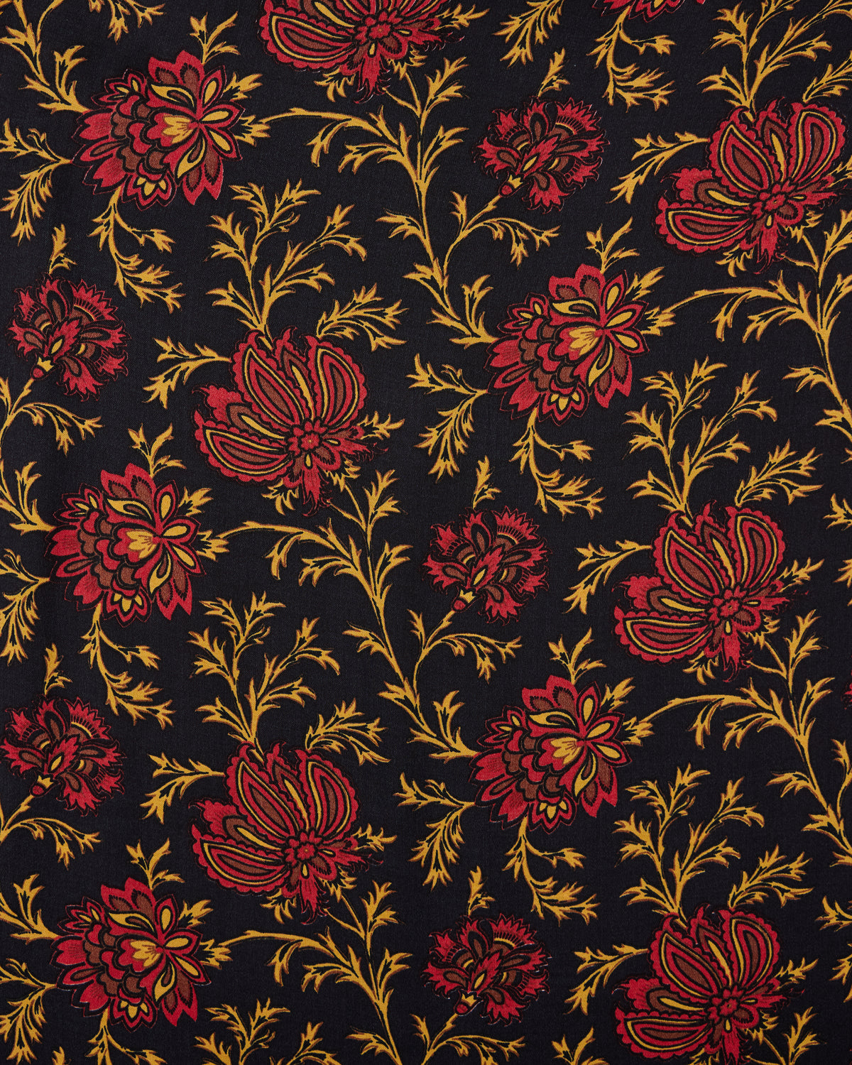 Close-up of the Midwinter Bloom floral print with red and gold flowers and leaves on a dark background.