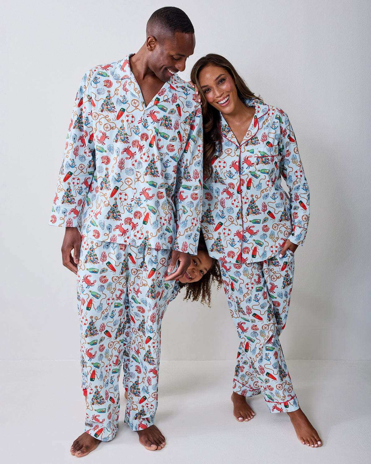 Front view of the men's Holidays Ahoy long pajama set with a light blue nautical holiday print.