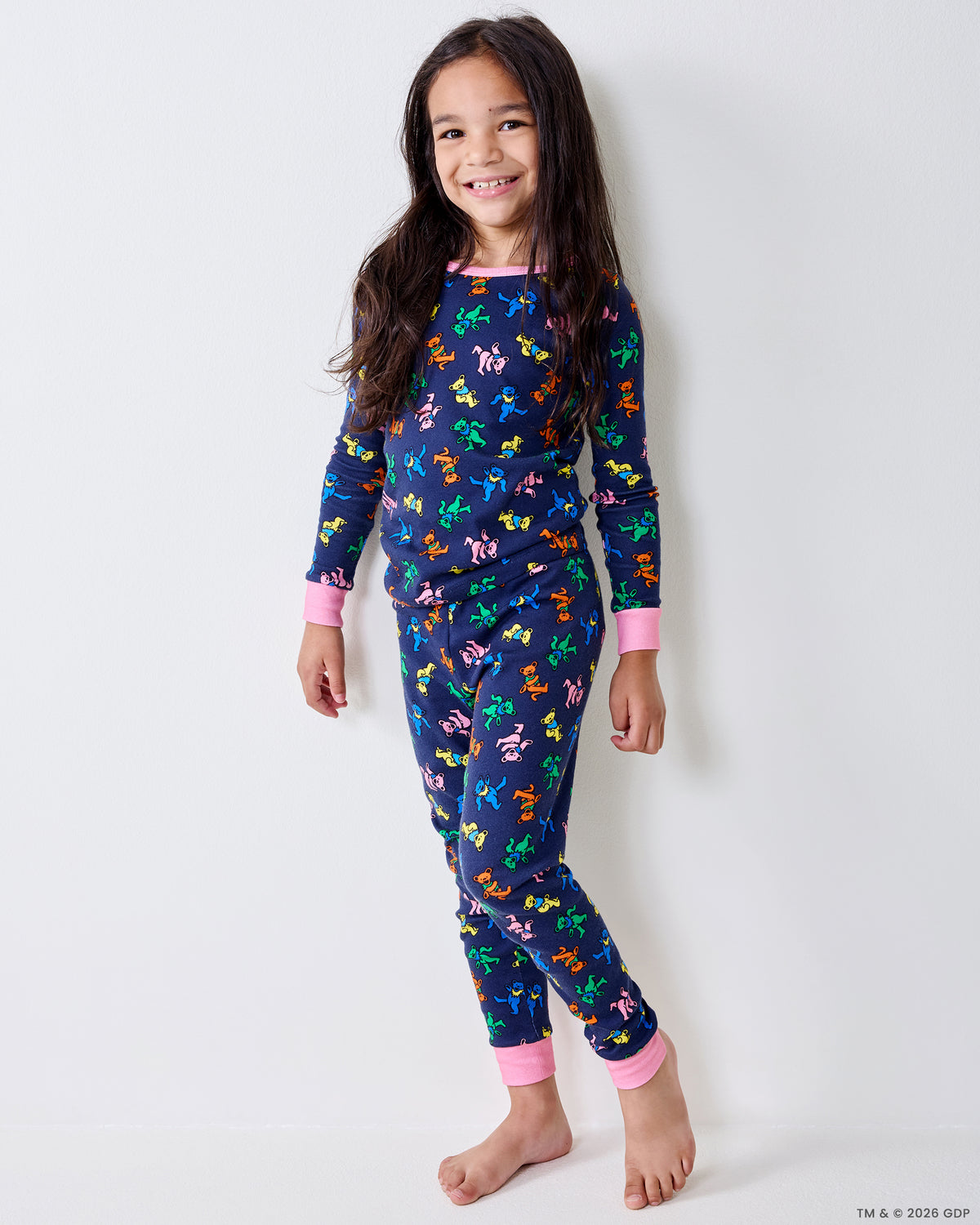 Child modeling the Dancing Bears kids pajama set in a standing pose.