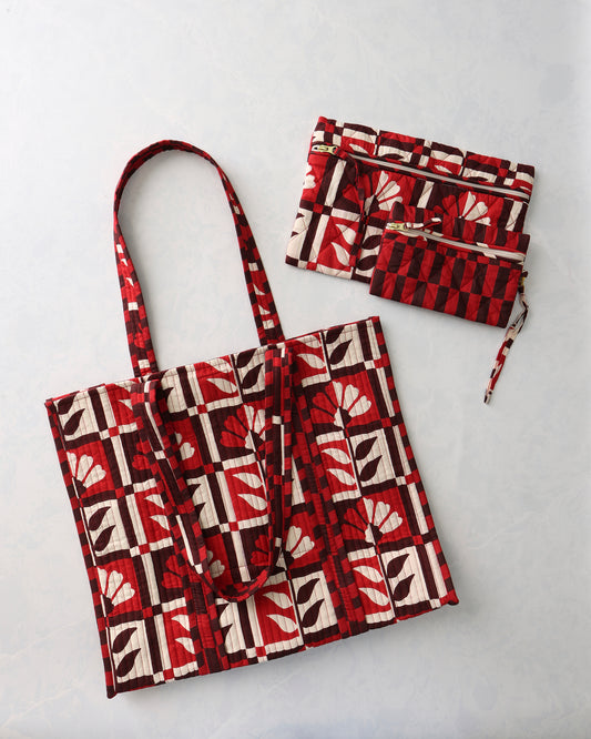 Bordeaux patterned tote and two matching zip pouches arranged at an angle.