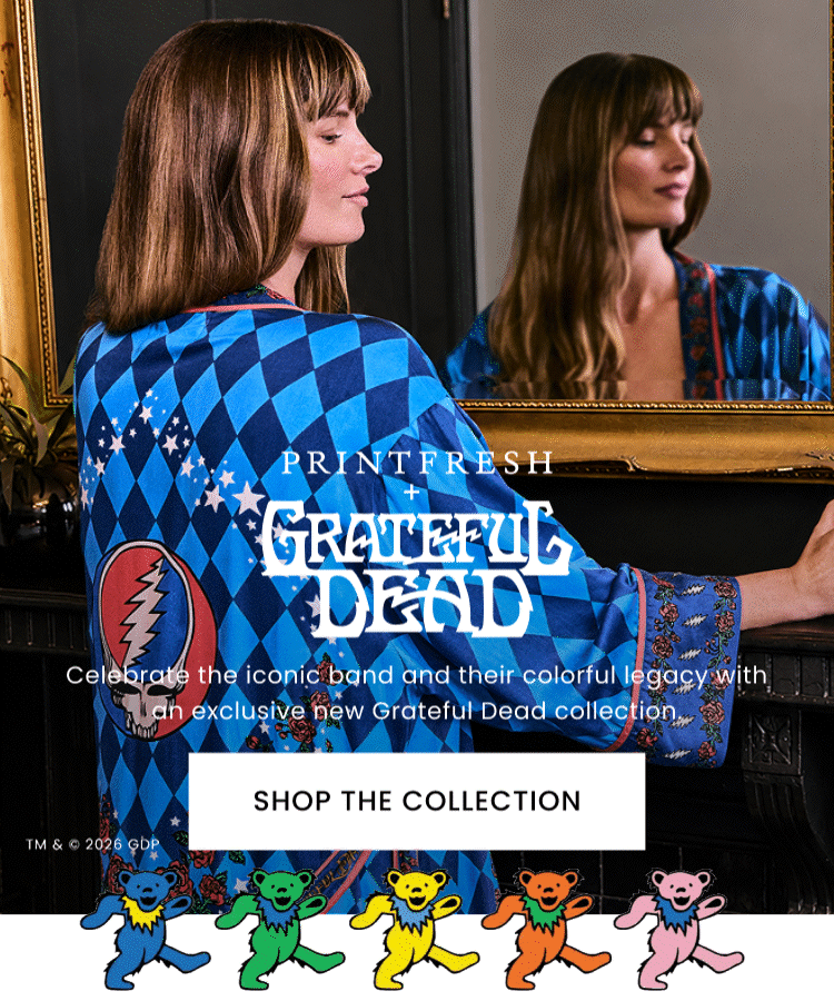 Promotional banner showing a person in a blue diamond-patterned jacket facing a mirror, with Grateful Dead branding, dancing bear figures, and a button labeled Shop the Collection.