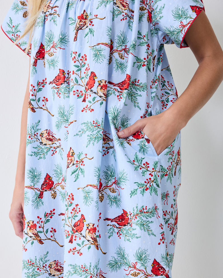 Close-up of the Winter Cardinals Retro Dreams nightgown showing its side pocket and bird-and-branch print.