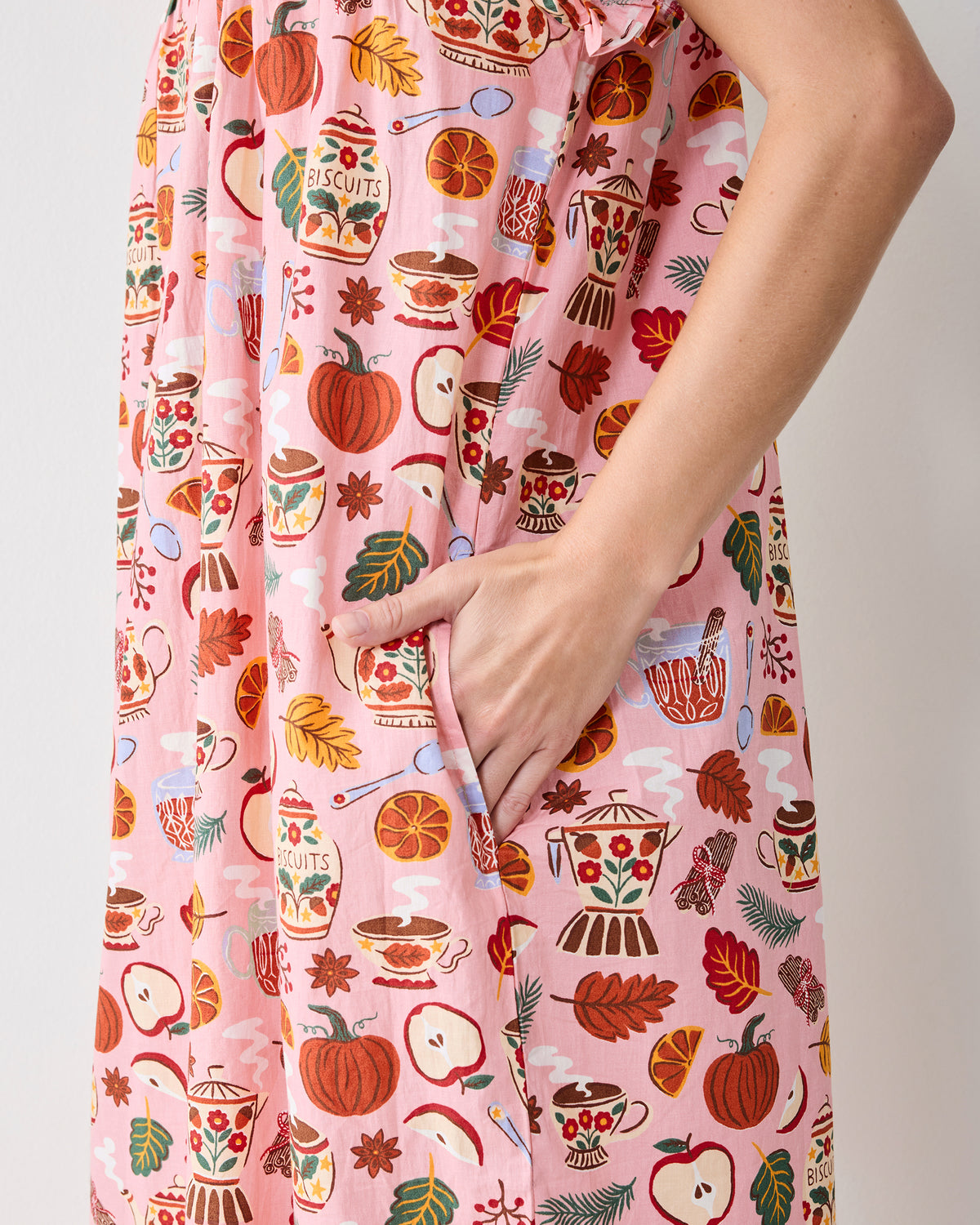 Close-up of the Autumn Cafe nightgown’s printed fabric and side pocket.