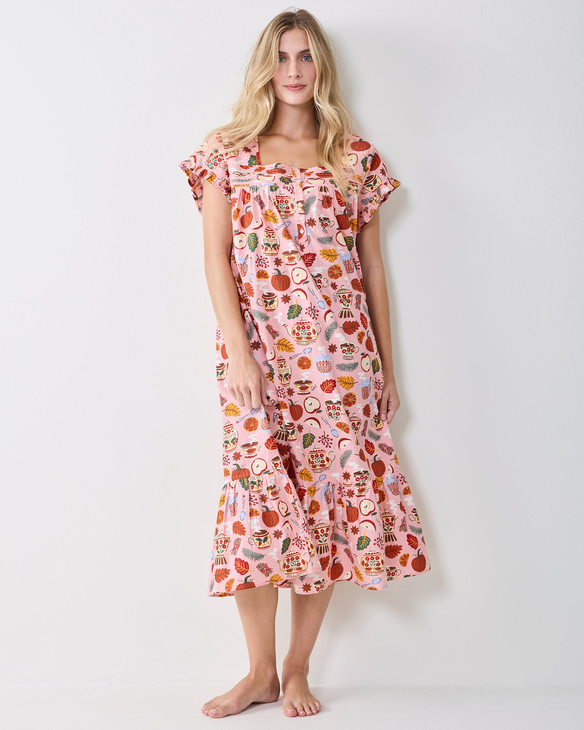 Front full-length view of the Autumn Cafe nightgown with short ruffled sleeves, button front, and ruffled midi hem.
