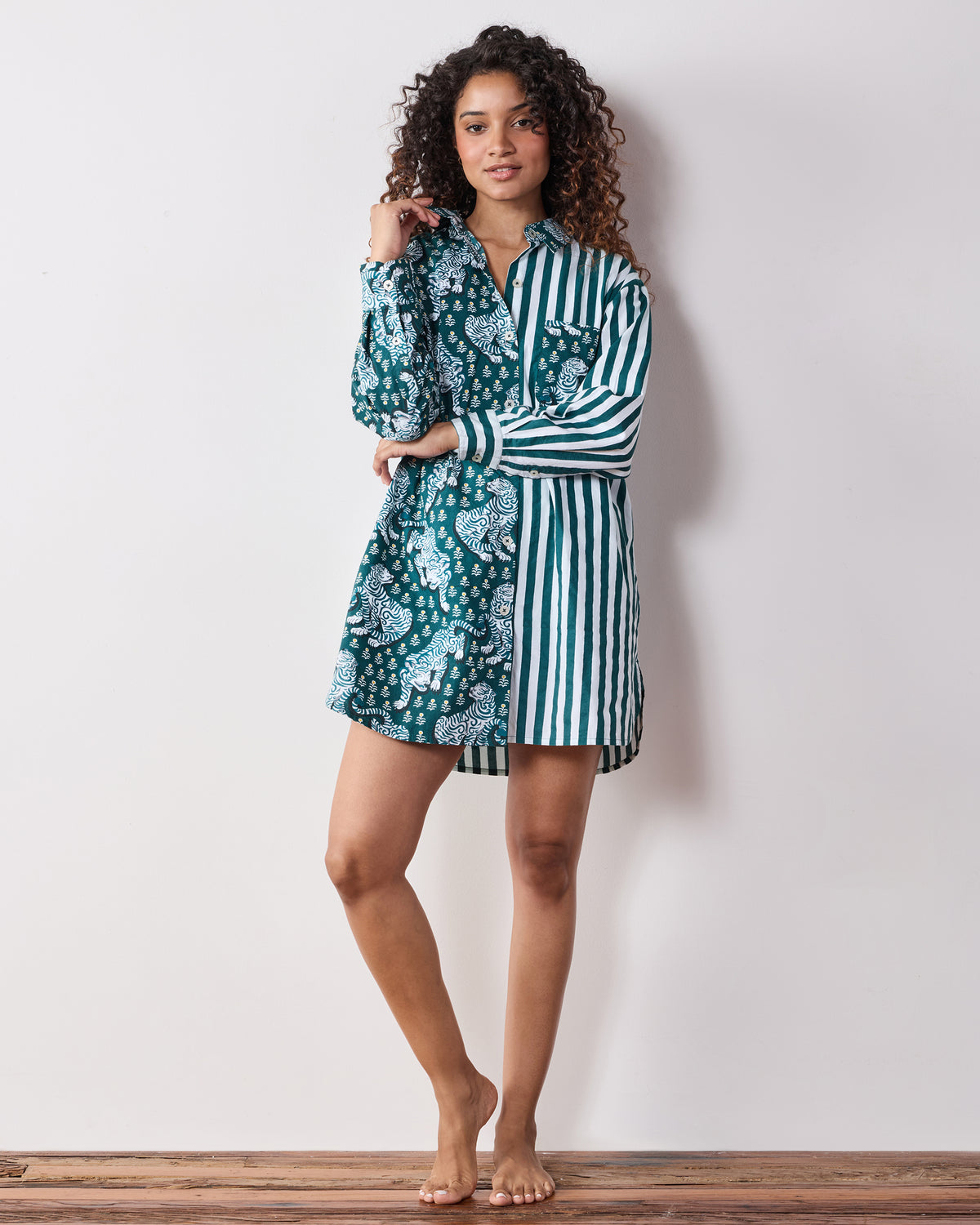 Full-length front view of the Tiger Queen button-down shirt with split tiger-print and green-and-white striped panels.