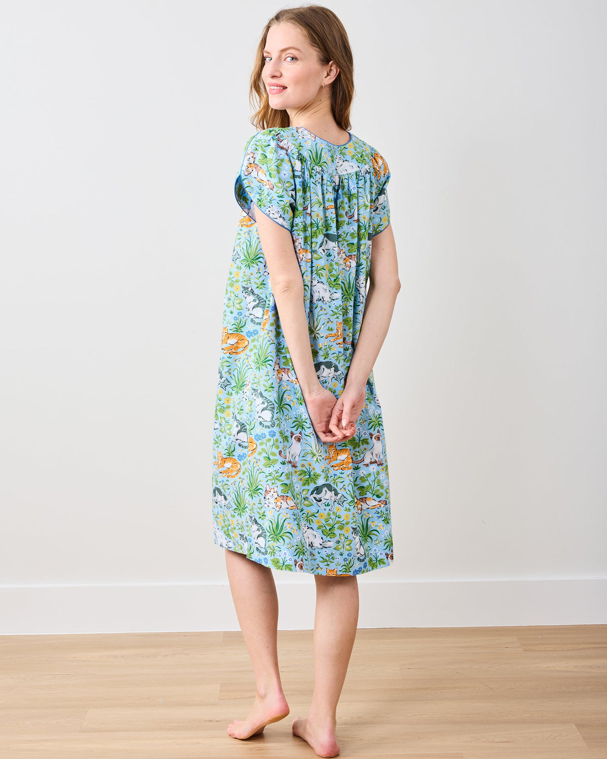 Back view of the Cornflower Must Love Cats Retro Dreams nightgown with short sleeves and a cat-and-floral print