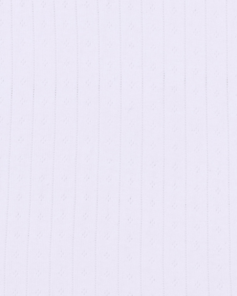 Close-up white fabric swatch showing vertical pointelle lines and small perforated details.