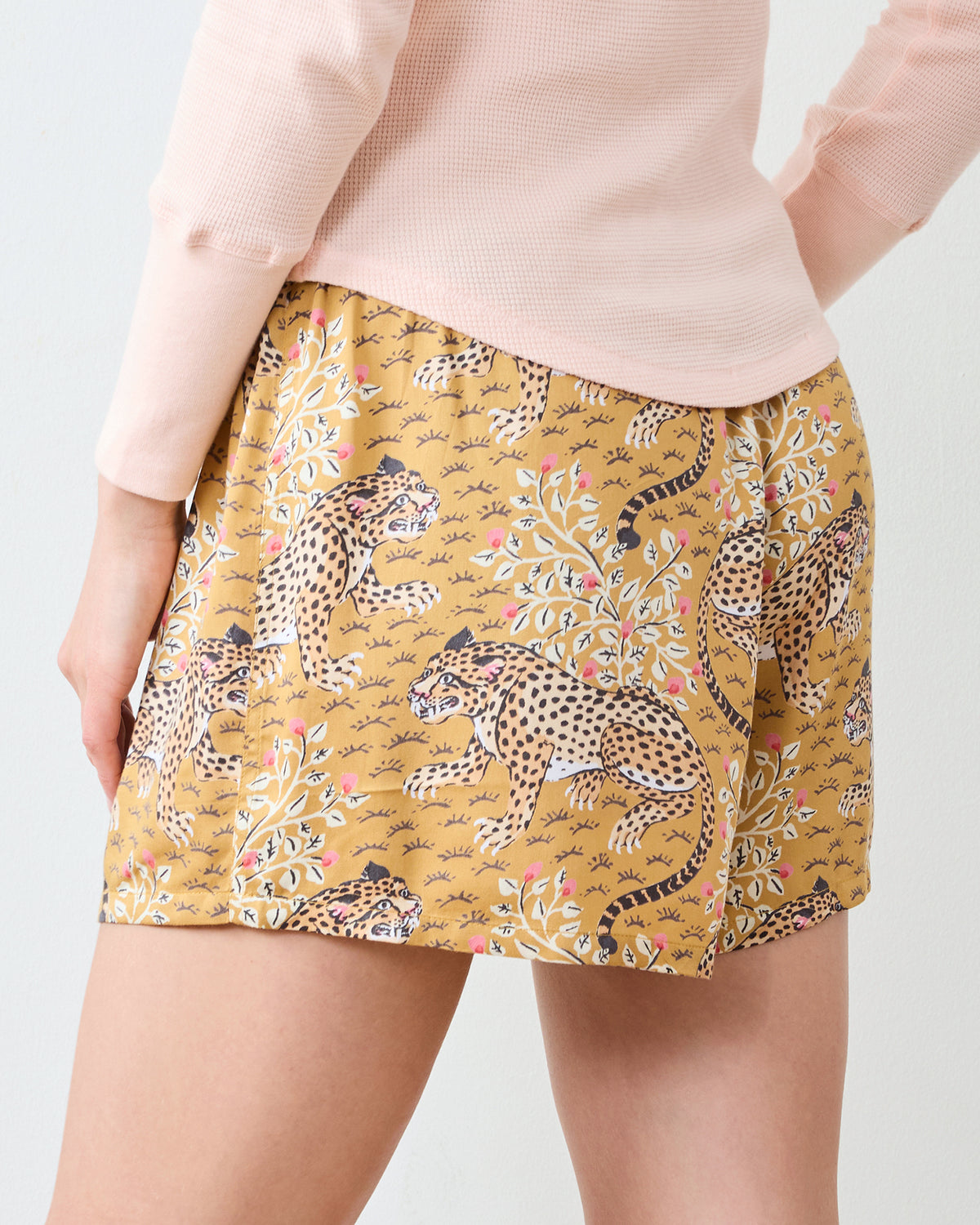 Close-up back view of tobacco Bagheera boyfriend boxers with a leopard print.