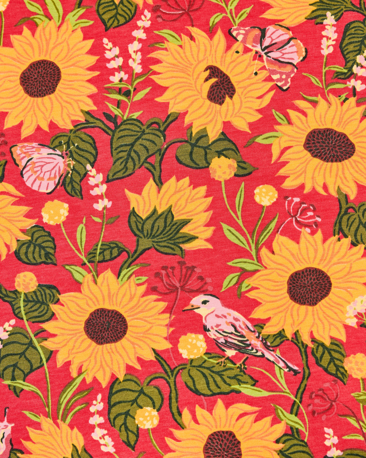 Close-up of a red sunflower print with yellow flowers, green leaves, birds, and butterflies.