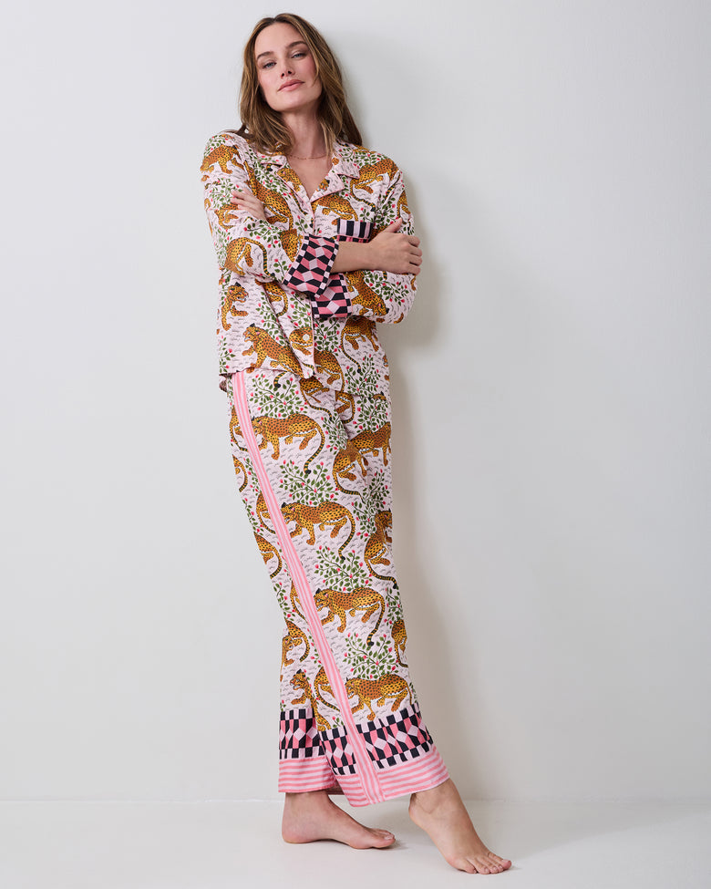 Full-length view of the Bagheera tall blush pajama set with a printed button-front top and wide-leg pants, shown on a model.