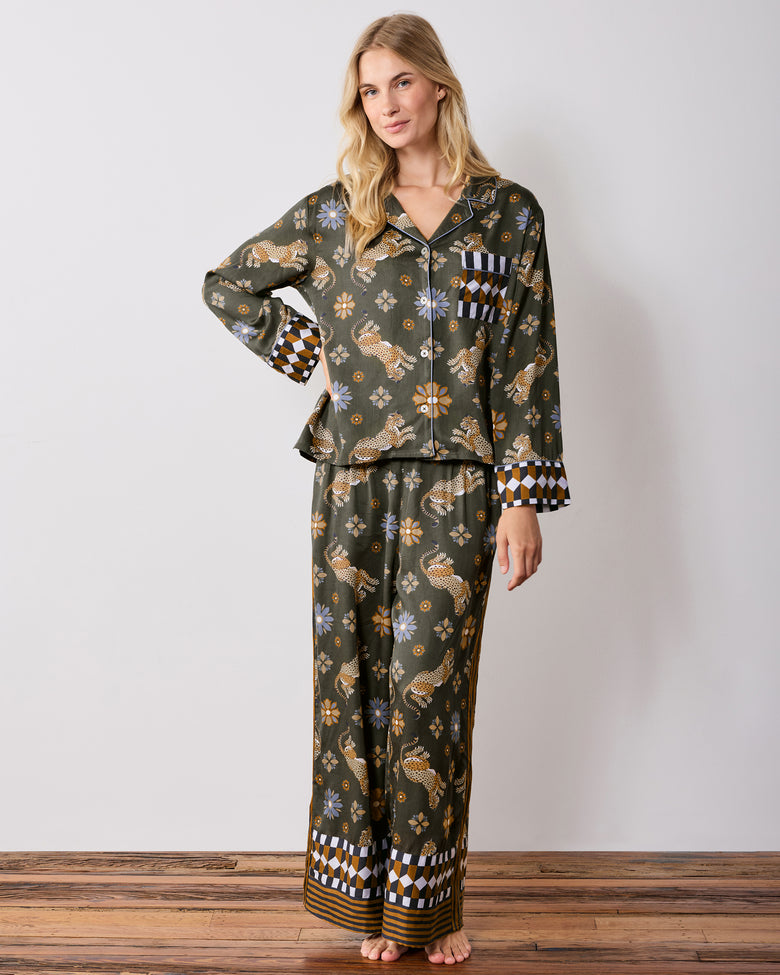 Front view of the olive petite Rittenhouse pajama set with a long-sleeve button-front shirt, wide-leg pants, leopard and flower print, and checkerboard trim.