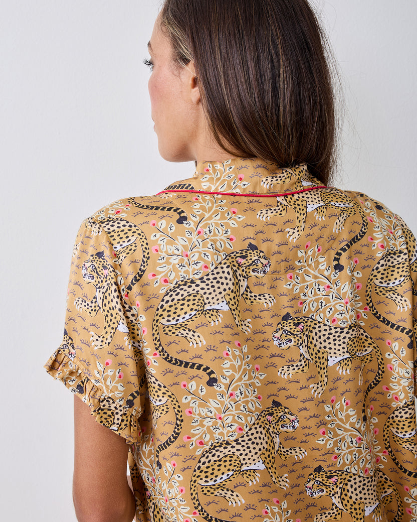 Close-up back view of the tobacco Bagheera leopard-print pajama top with ruffled sleeve trim.
