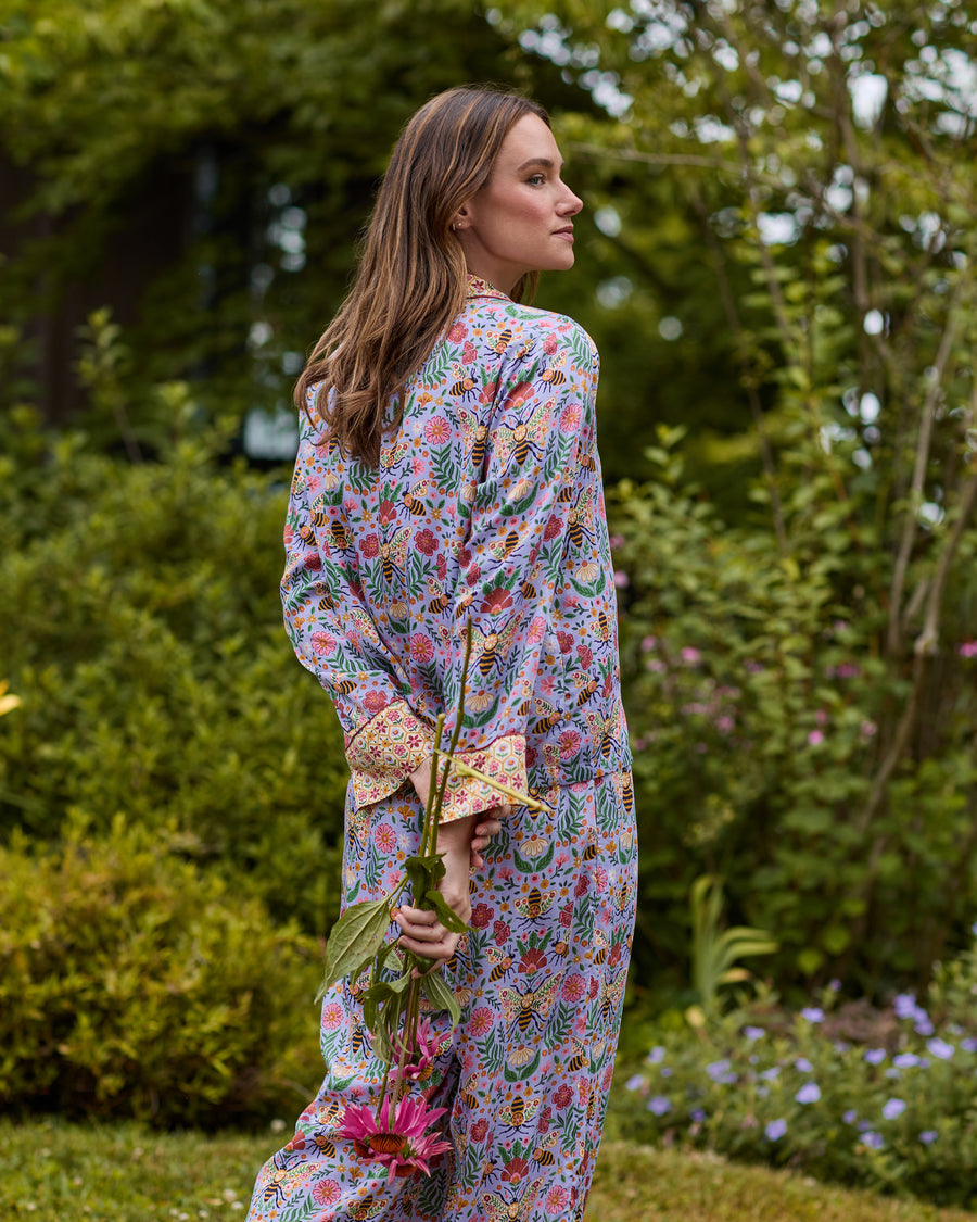 Back view of the lavender Bee Tapestry long-sleeve pajama set with bee-and-floral print.