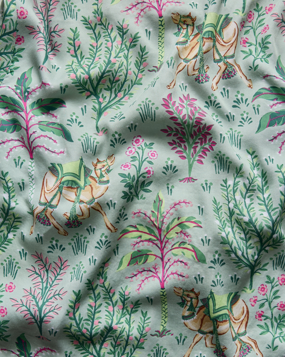 Avocado camel-and-desert-botanical pattern swatch for the Camel's Courtyard Eco Satin Rittenhouse Set.