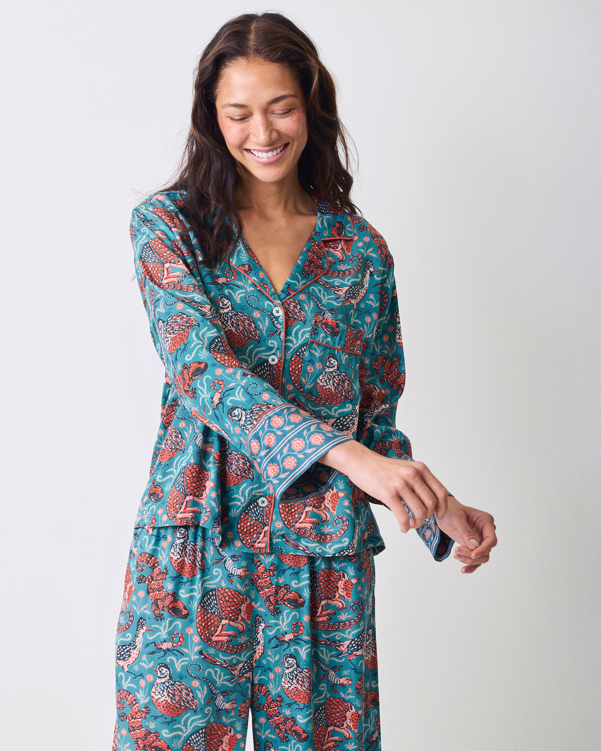 Front view of the teal Canyon Critters Eco Satin Soho Set with a button-front long-sleeve top and wide-leg pants.