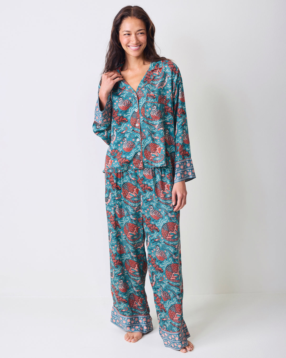 Full-length front view of the teal Canyon Critters Petite Eco Satin Soho Set with a button-front long-sleeve top and wide-leg pants.