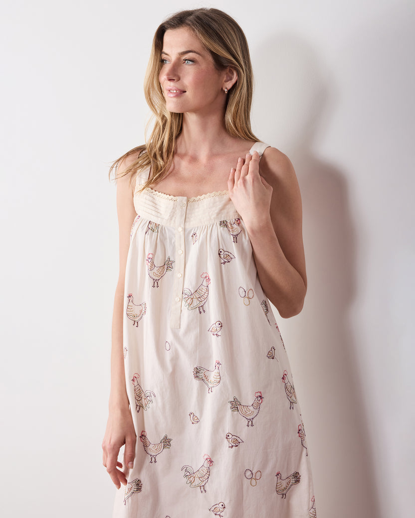 Front angled view of the buff embroidered-hen Back to Bed nightgown.