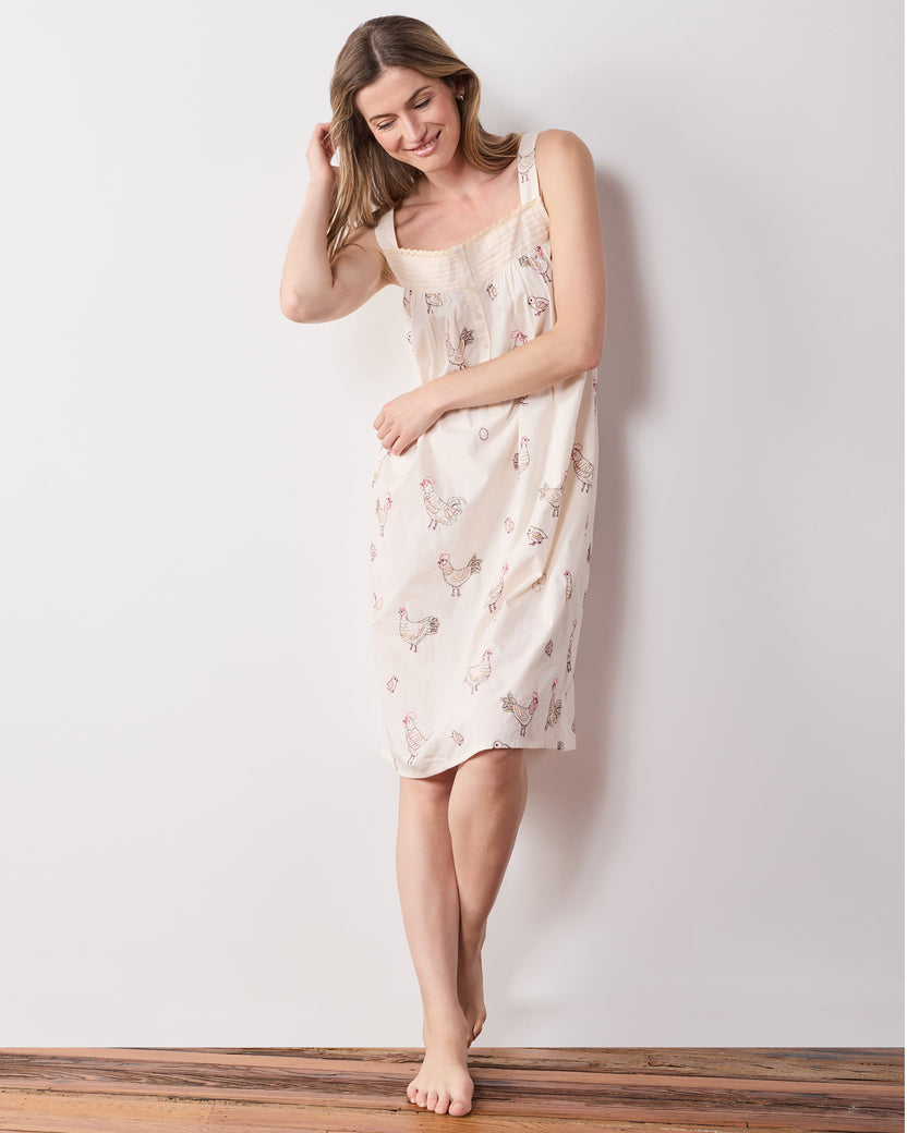 Full-length view of the buff embroidered-hen Back to Bed nightgown.