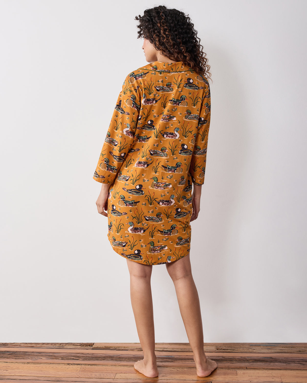 Back view of the mustard Duck Pond button-down sleep shirt with an all-over duck-and-reed print.