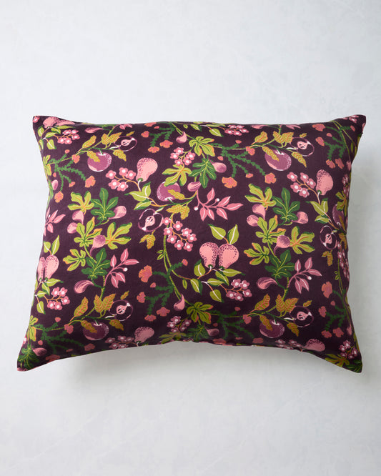 Plum Pomme & Poire pillowcase with an all-over pattern of apples, pears, flowers, and green leaves.