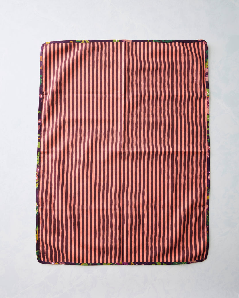 Reverse side of the Pomme & Poire plum tea towel set, showing pink and dark vertical stripes.