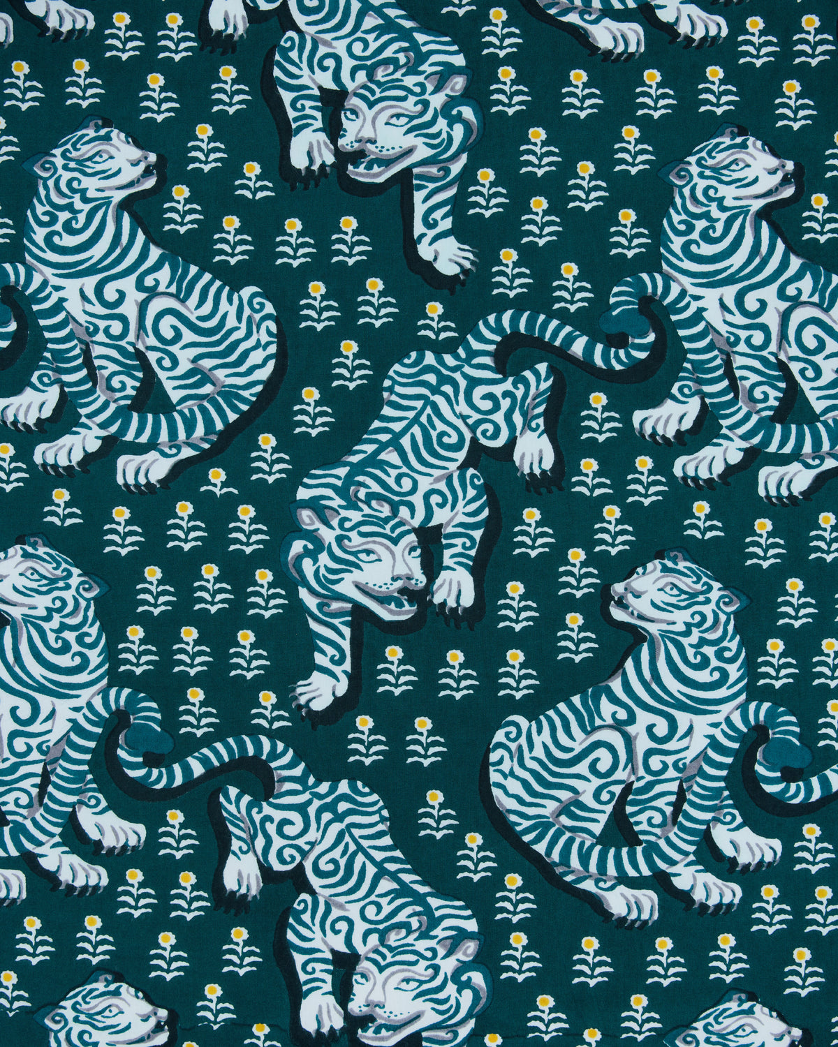 Game Day Green pajama fabric with a repeating pattern of white-and-blue tigers and small white flowers with yellow centers
