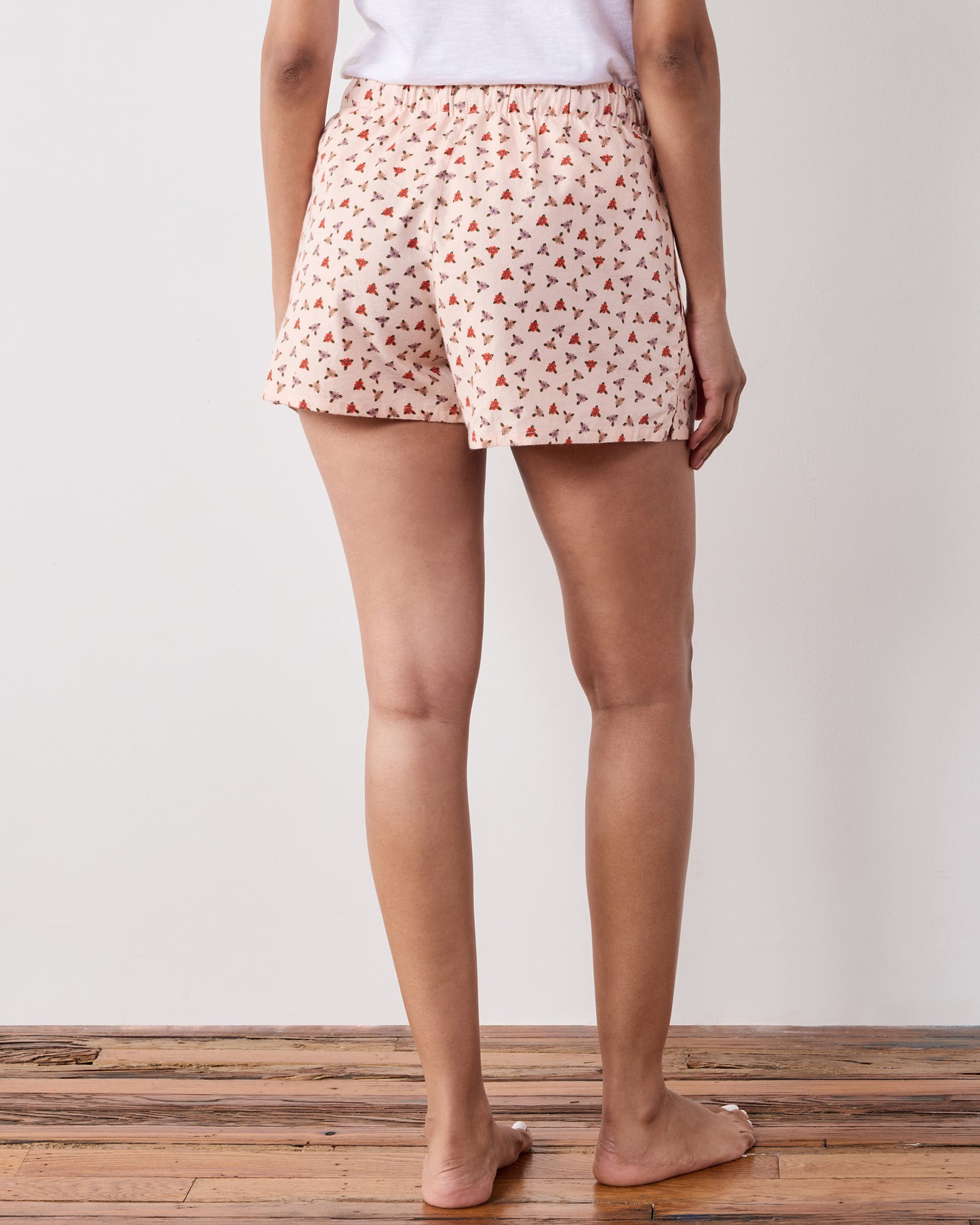 Back view of the Western Scenes Astrid shorts, showing the repeating print and elasticized waistband.
