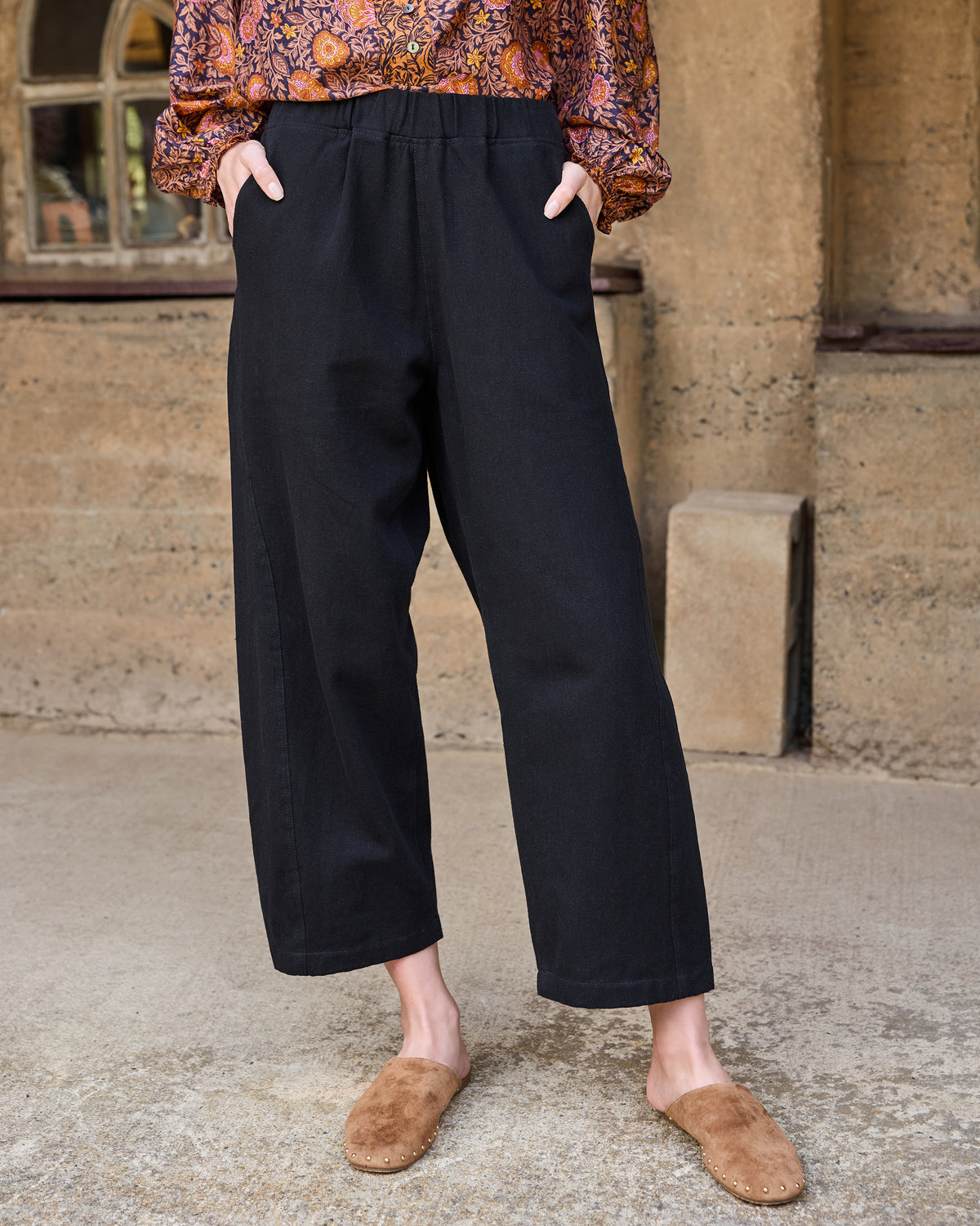 Front detail of the Wilder Pant showing the wide-leg cut, elastic waistband, and side pockets.
