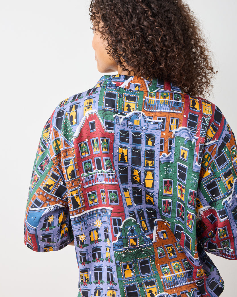 Back view of the Manhattan Christmas cropped pajama top showing the colorful brownstone and holiday window print.