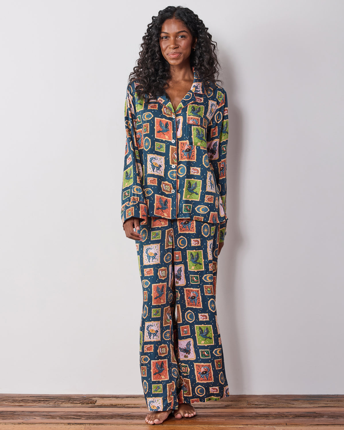 Person wearing the Midnight Gallery Night Sky long-sleeve pajama set, shown full length from the front.