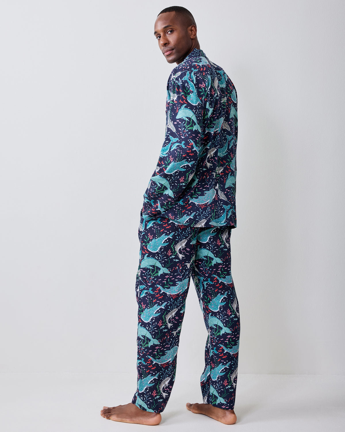 Back view of the Arctic Sealife long pajama set with a dark navy marine-life print.