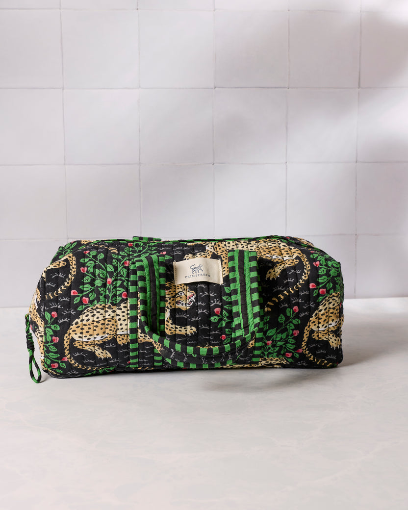 Quilted Bagheera Ink hair tool travel case with leopard-and-leaf print, zipper, and Printfresh label.