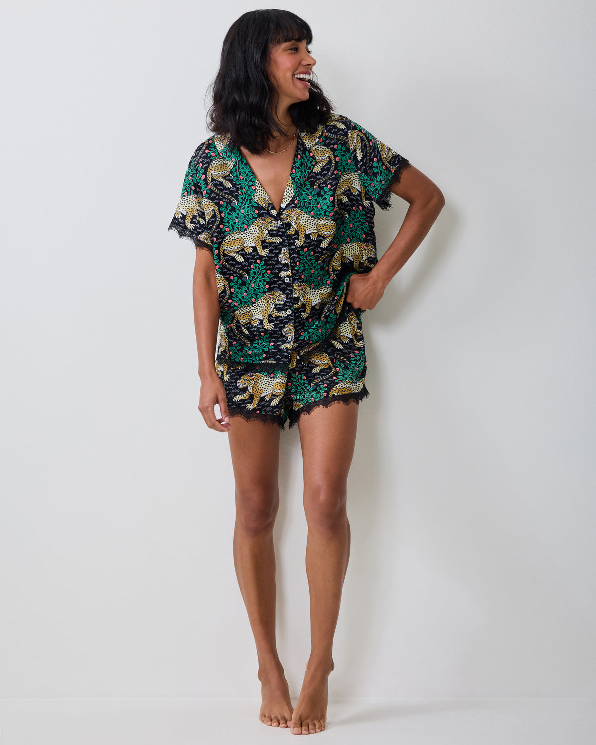 Full-length view of the Bagheera Eco Satin Maryanne Set in Ink, showing the short-sleeve button-front top and matching lace-trimmed shorts.