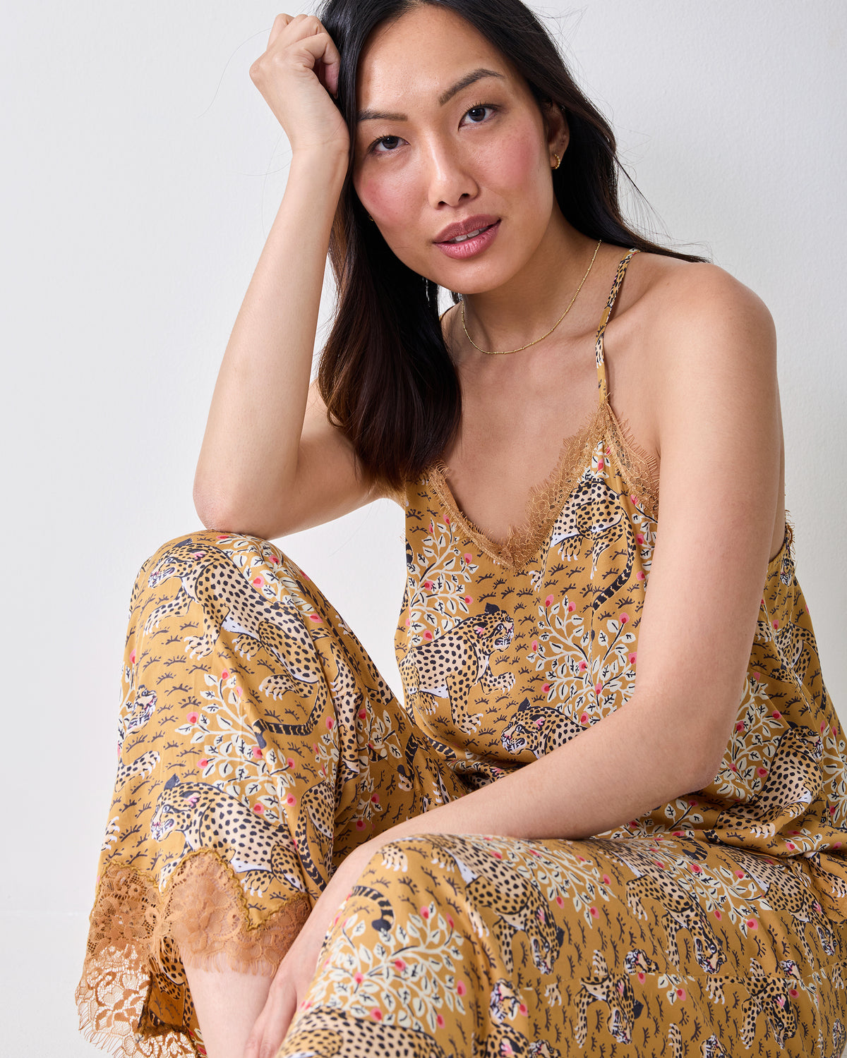 Close view of the Bagheera Tobacco Georgia pajama set, showing the lace-trimmed cami neckline and printed pants.