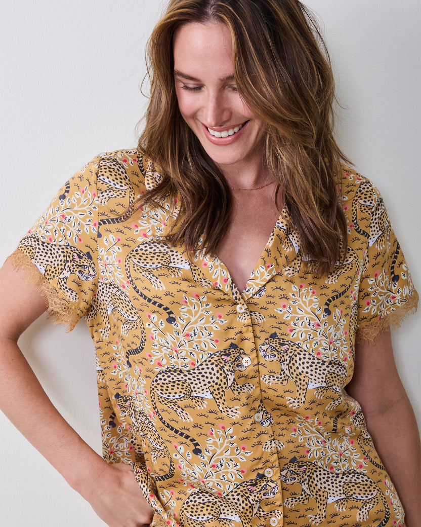 Close view of the Bagheera Tobacco Jackie pajama top showing its collar, buttons, short sleeves, and printed design.