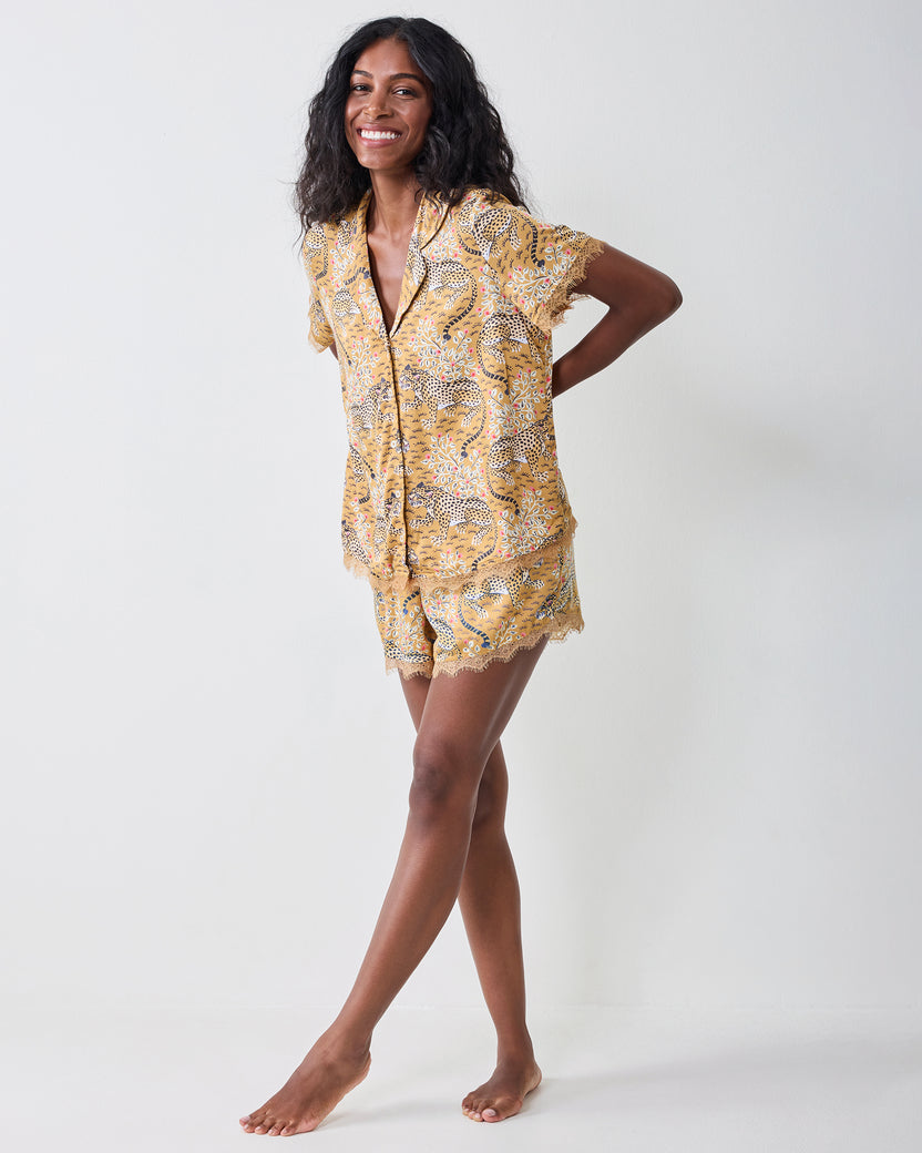 Full-length front view of the tobacco Bagheera Maryanne set with a short-sleeved collared top and matching lace-trimmed shorts.