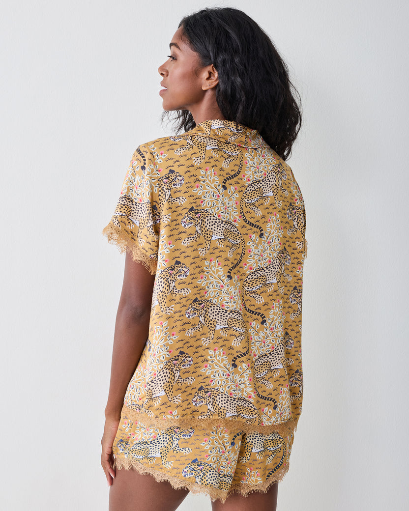 Back view of the tobacco Bagheera Maryanne set with a short-sleeved top and matching lace-trimmed shorts.