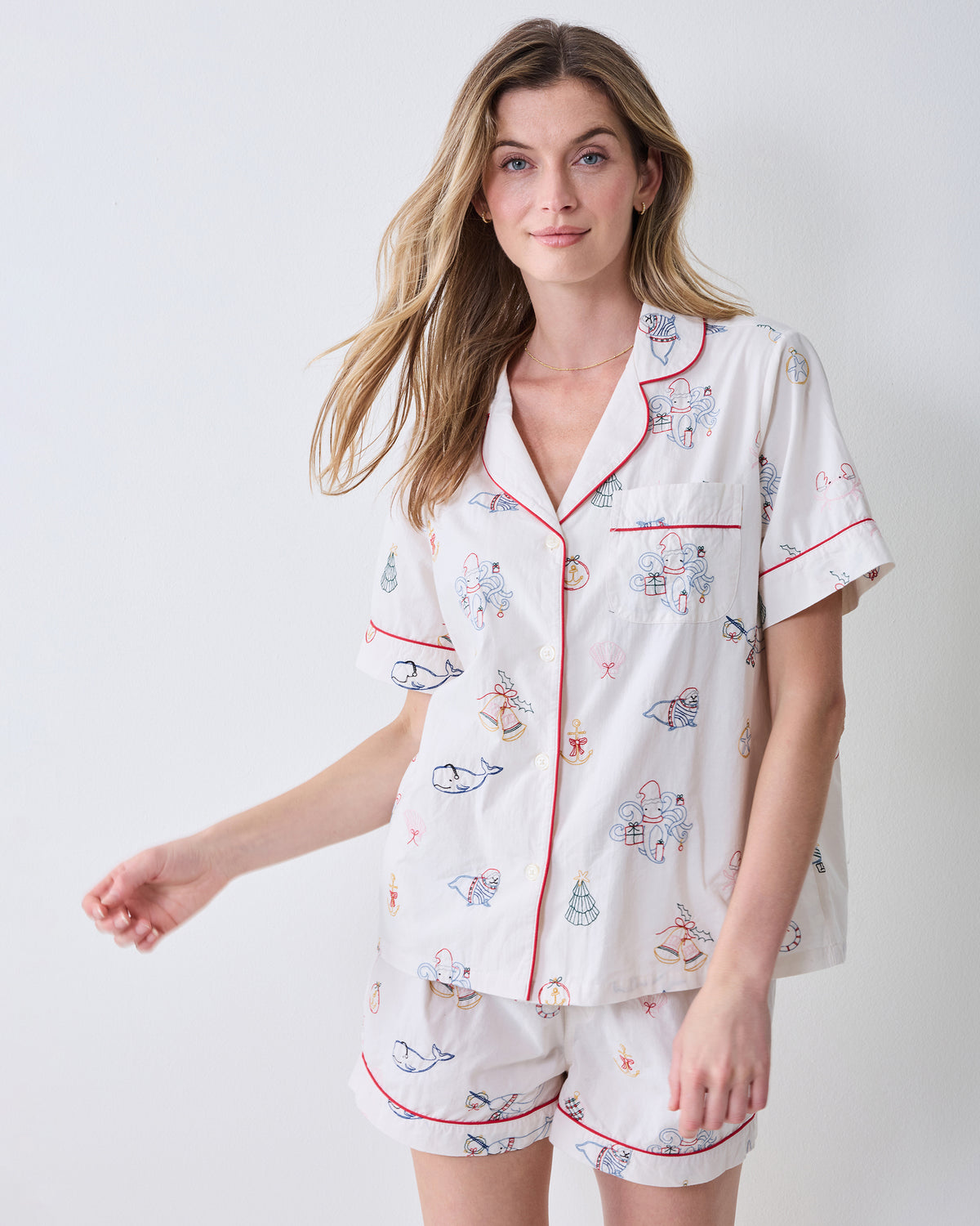 Front view of the embroidered Yule Tides cloud Short PJ Set with a collared button-front top and matching shorts.