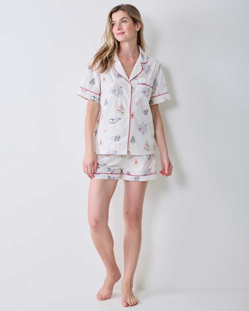 Full-length front view of the embroidered Yule Tides cloud Short PJ Set with a collared top and matching shorts.