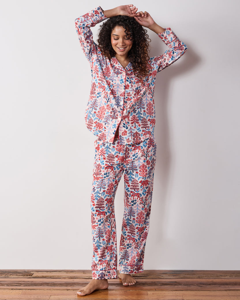 Full-length front view of the cream Folklore Forest long pajama set with matching button-front top and pants.