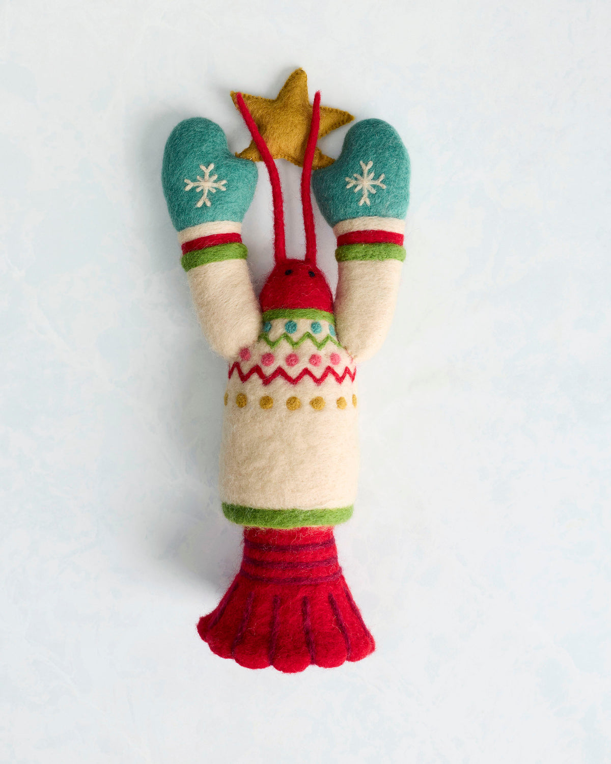 Felt lobster tree topper displayed upright with raised mittens, a gold star, and a red tail.