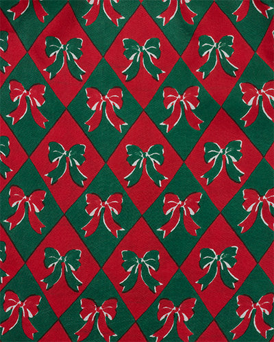 Close-up of the red and green argyle bow print on the Holiday Argyle boxer shorts.