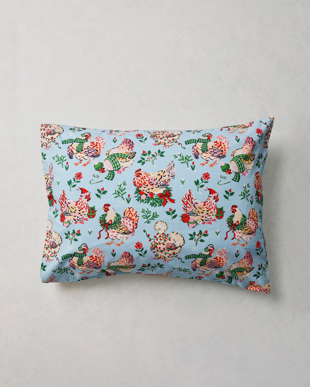 Single pale blue Holiday Hens pillowcase shown flat against a light background.