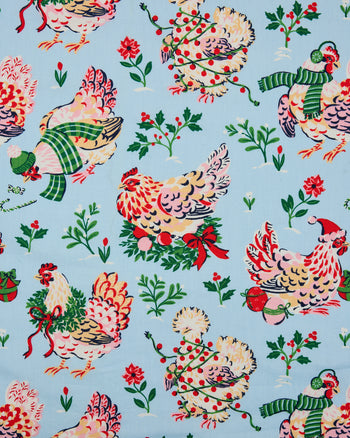 Pale blue Holiday Hens pajama print with illustrated hens, holly sprigs, flowers, and seasonal accessories.