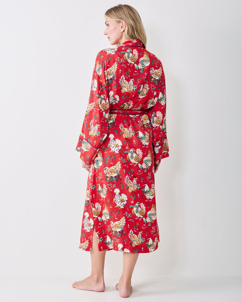 Back view of a red Holiday Hens printed satin robe with a contrasting belt and long sleeves.
