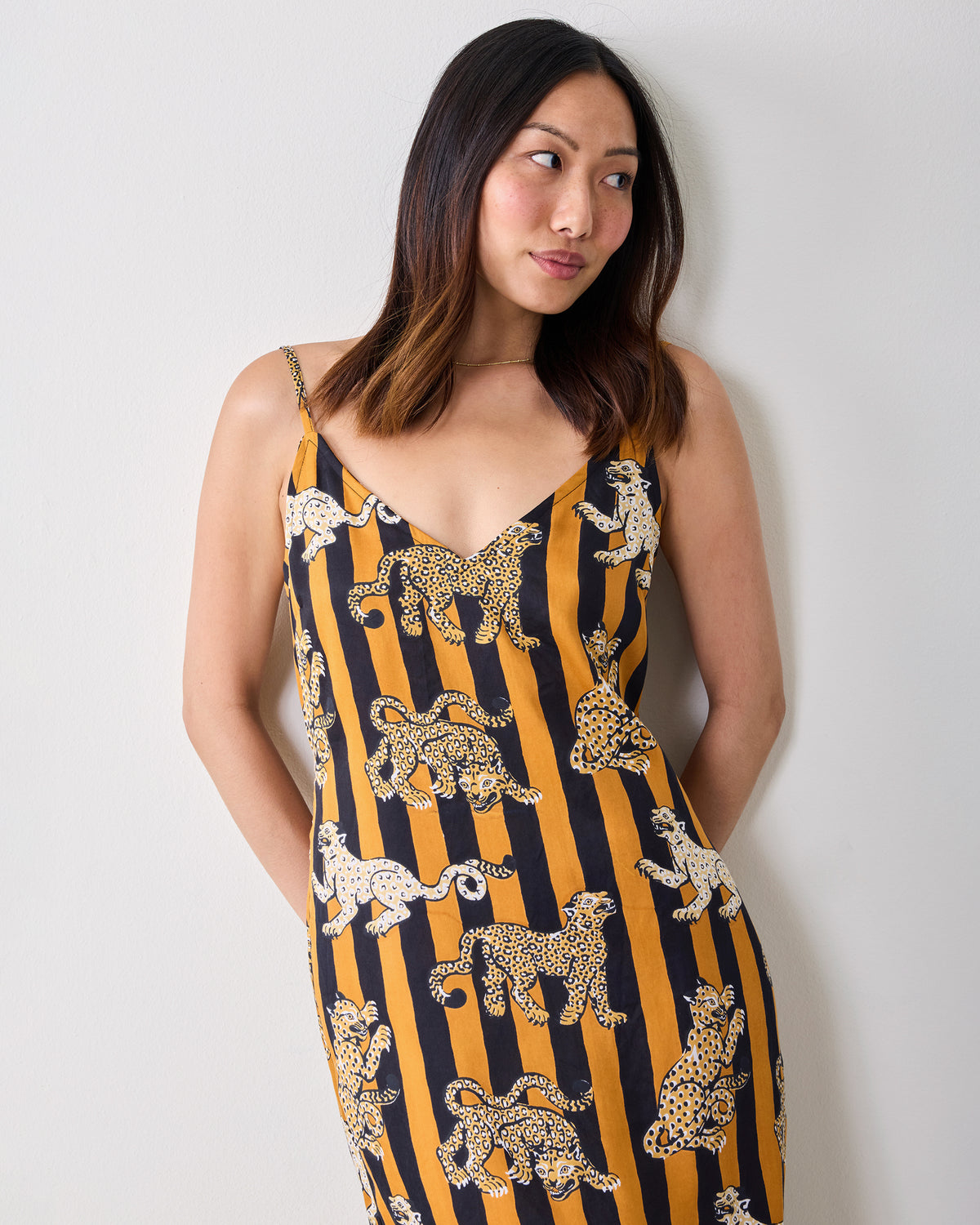 Front view of a striped leopard-print nightie with thin straps and a V-neckline.