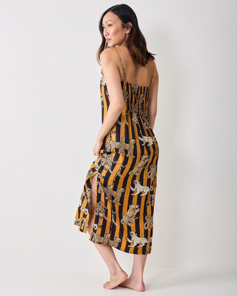 Back and side view of a butterscotch striped leopard-print nightie with thin straps and a below-knee skirt.
