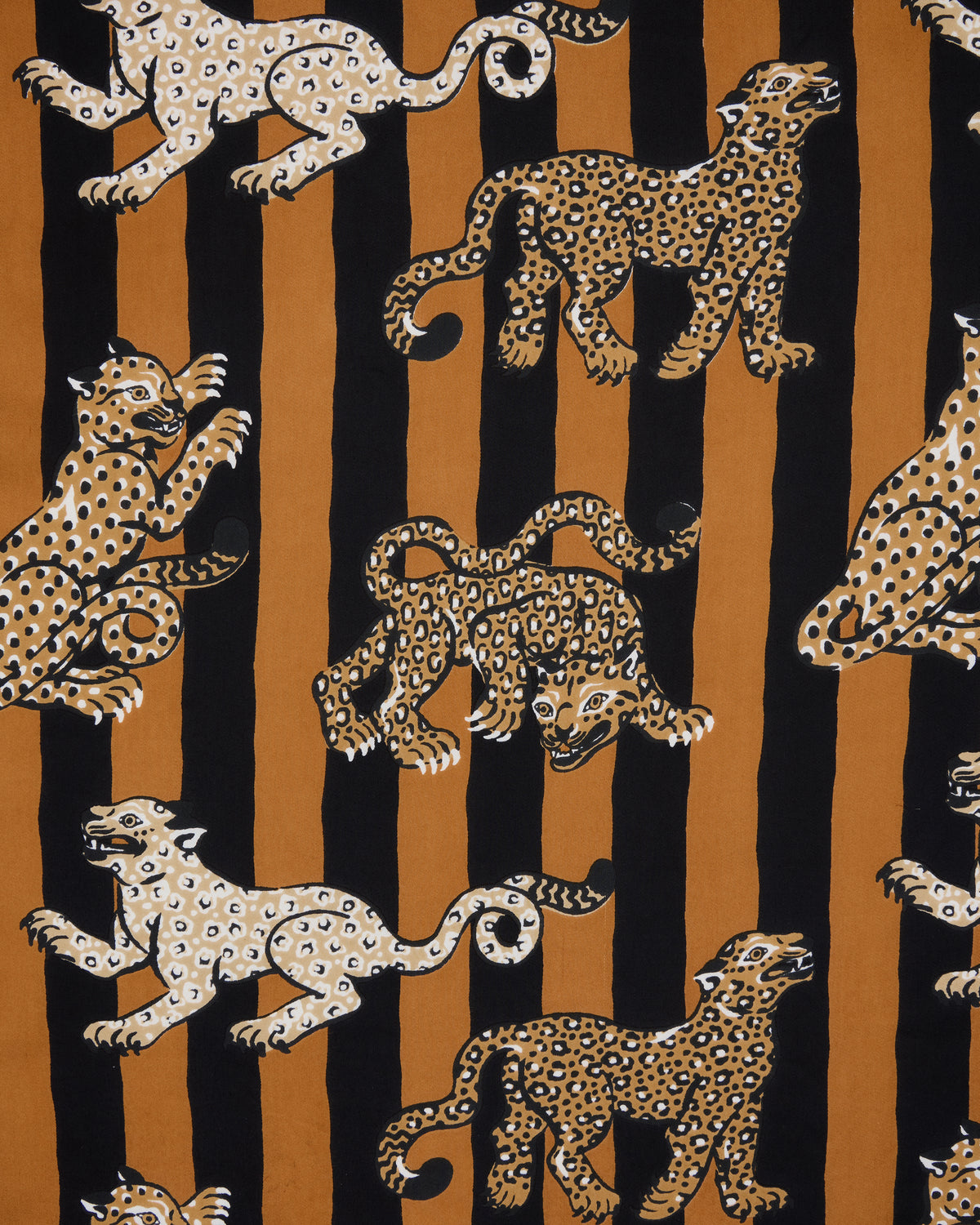 Close-up of the leopard stripe print with spotted leopard illustrations on alternating butterscotch and black vertical stripes.