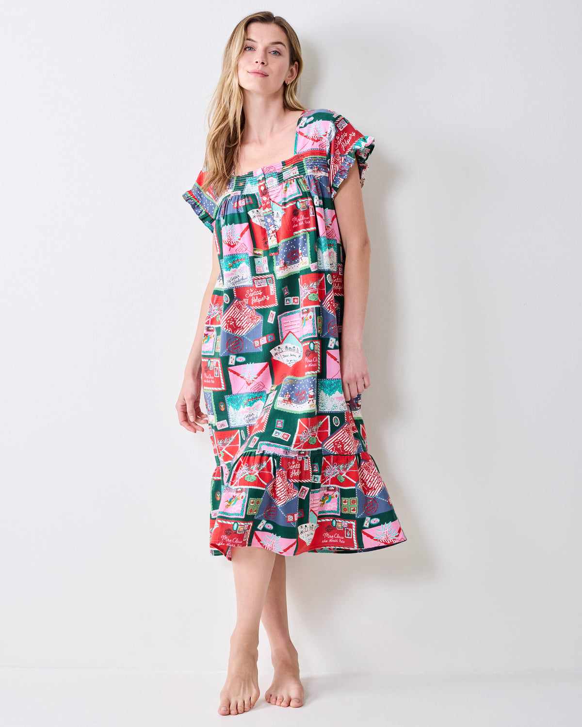 Full-length view of the Letters to Santa printed daylight nightgown, showing its loose silhouette and ruffled hem.