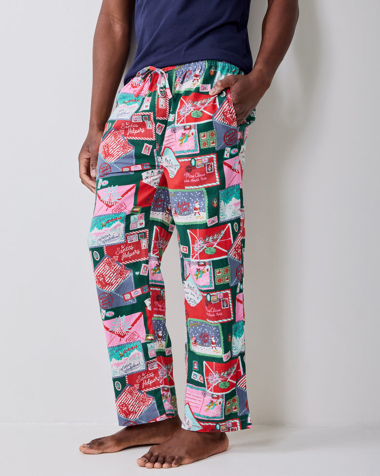 Front lower-body view of the long printed pajama pants, showing the drawstring waist, pockets, and straight legs.